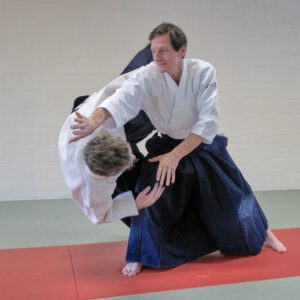 Peter Van Macke Shihan mitten in einer Aikido Technik